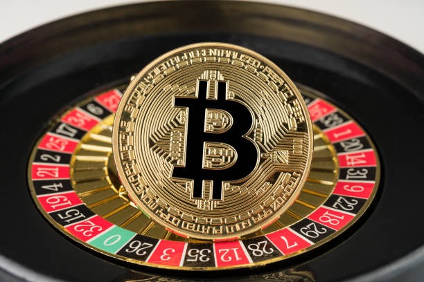 Live dealer spinning the roulette wheel